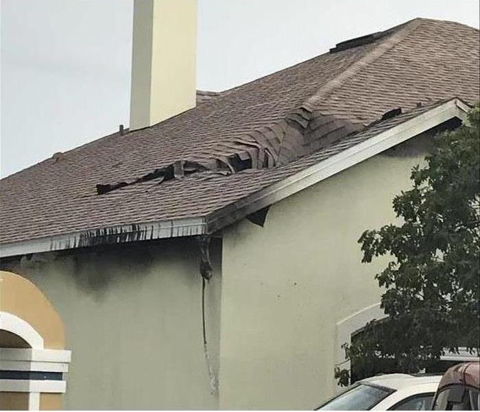 Roof damaged by a storm.